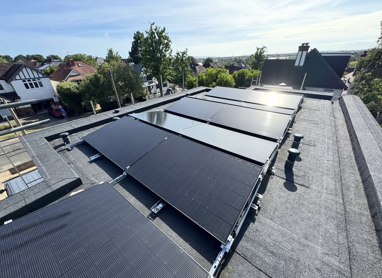Flat roof with rows of solar panels
