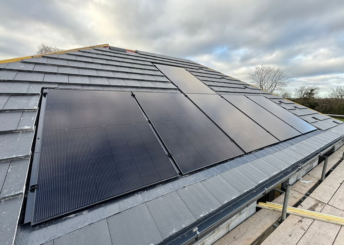 In-roof solar panels on a new slate roof during construction